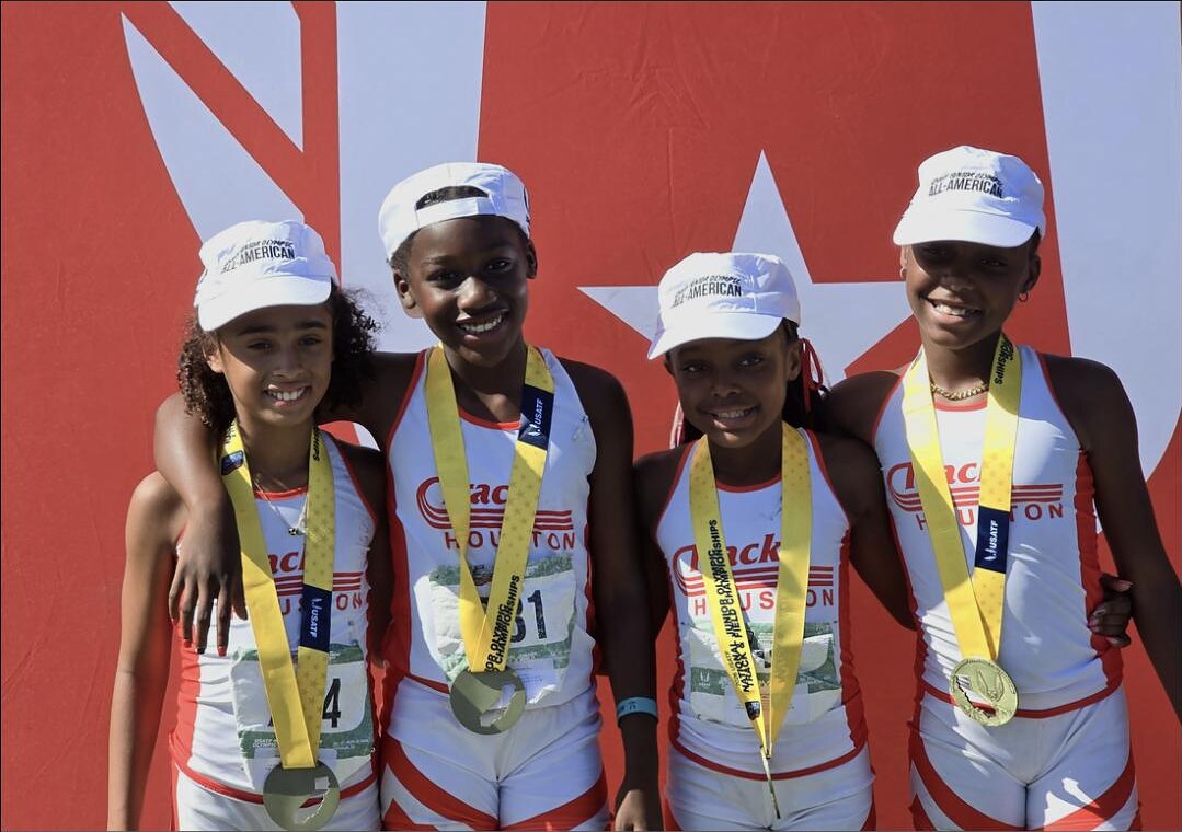 9-10 Girls 4x400m relay on the podium at the 2026 National Junior Olympics